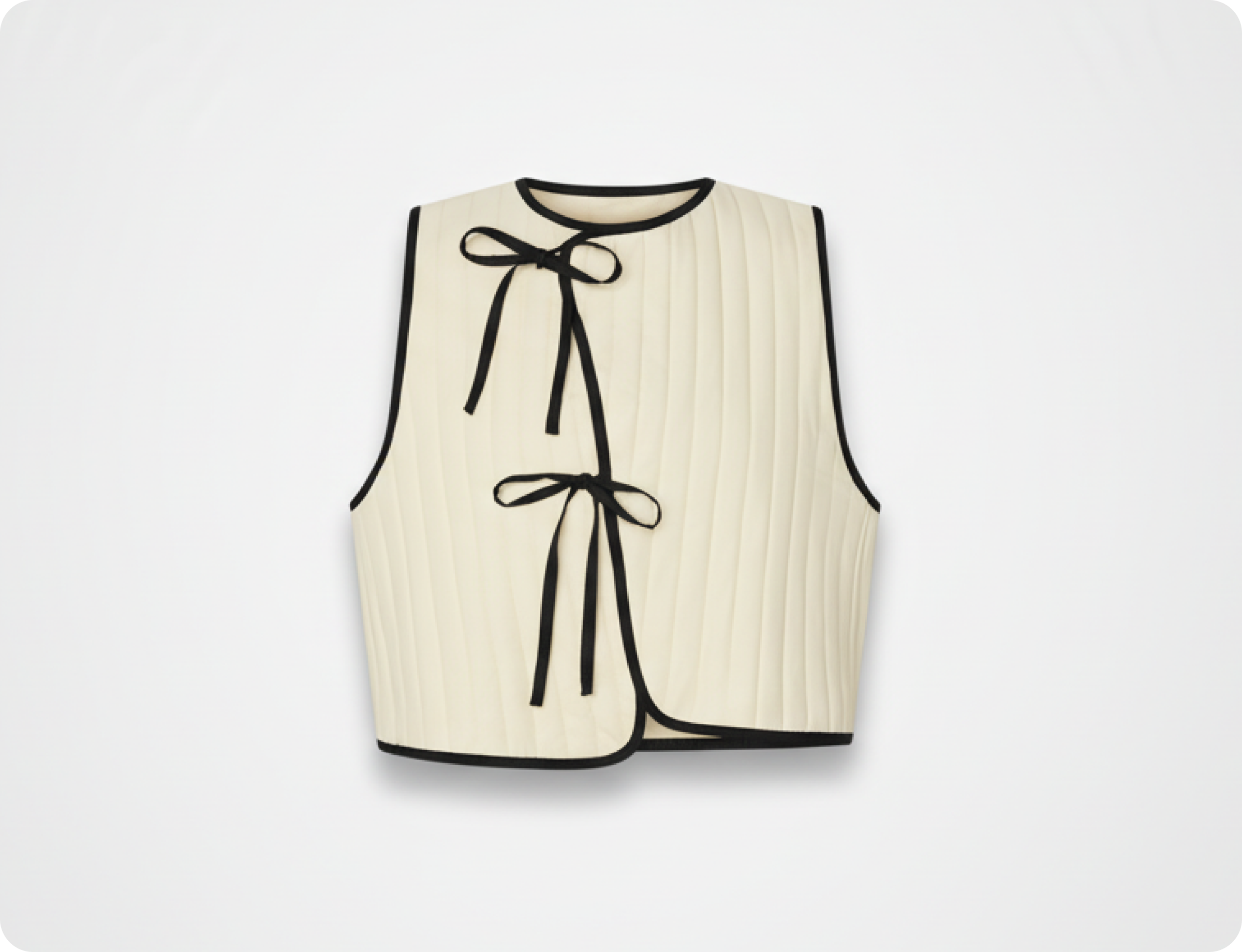 White vest with black bow fashion item