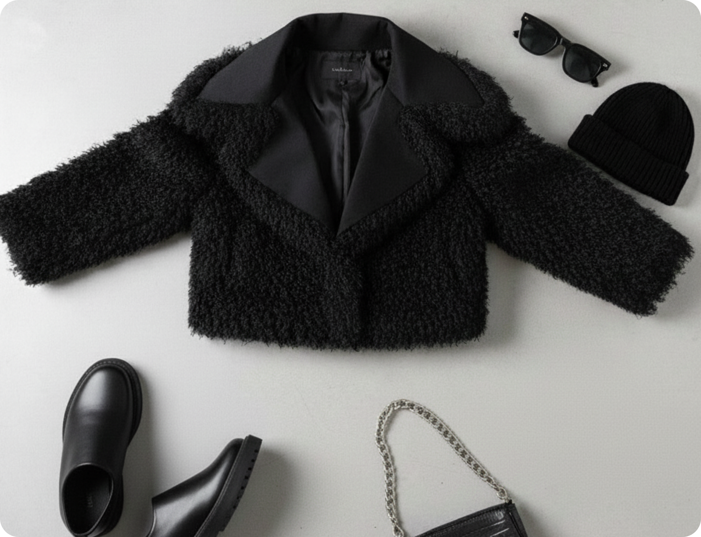 Black fur coat with accessories fashion flat lay